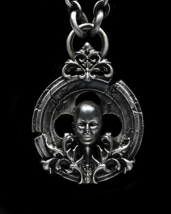 Infinity' pendant in solid double face